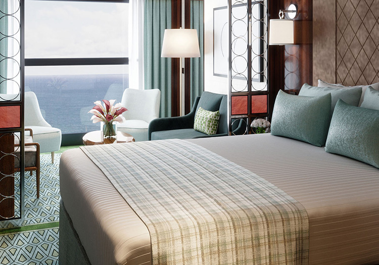 Stylish bedroom and living area on Atlas Ocean Voyages ship