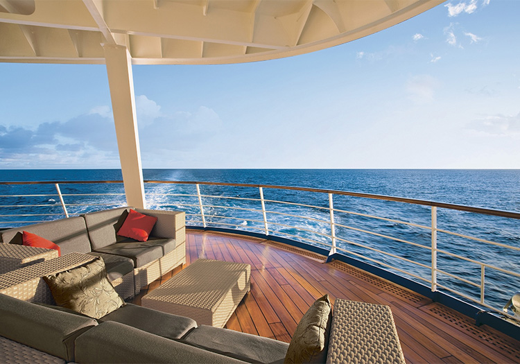 Outdoor sofas on rear deck of 5-Star cruise ship