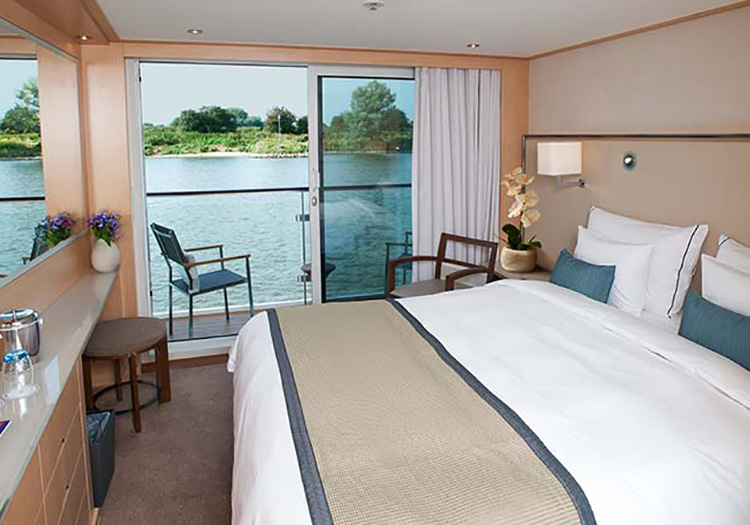 Bedroom and balcony aboard 5-Star Viking River Cruise
