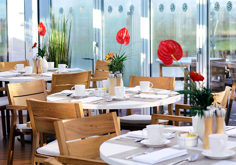 Contemporary dining area with fun flower arrangements